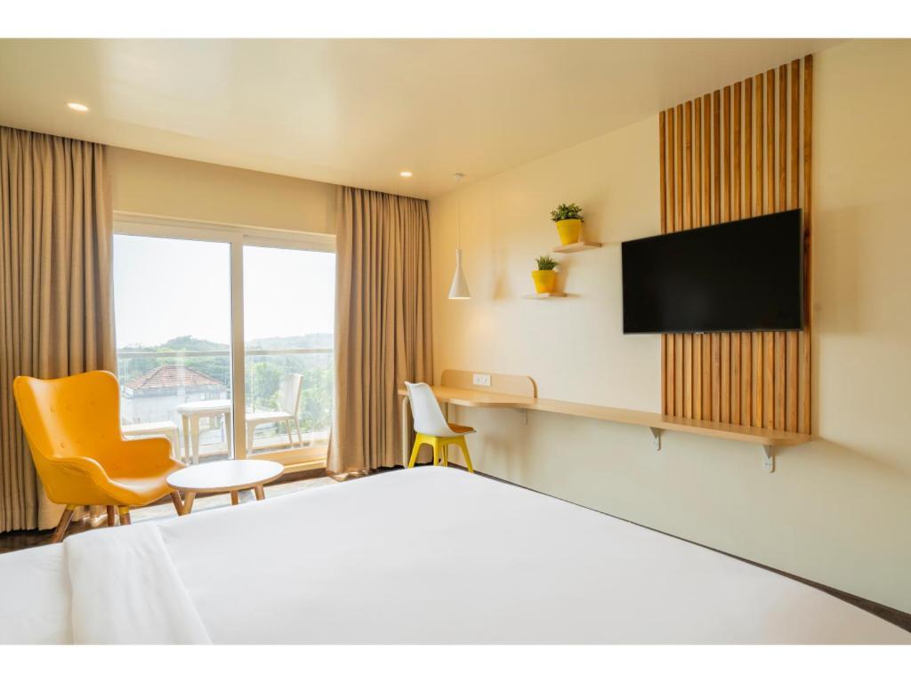 Bloom Hotel - Dona Paula Панаджи Стая снимка